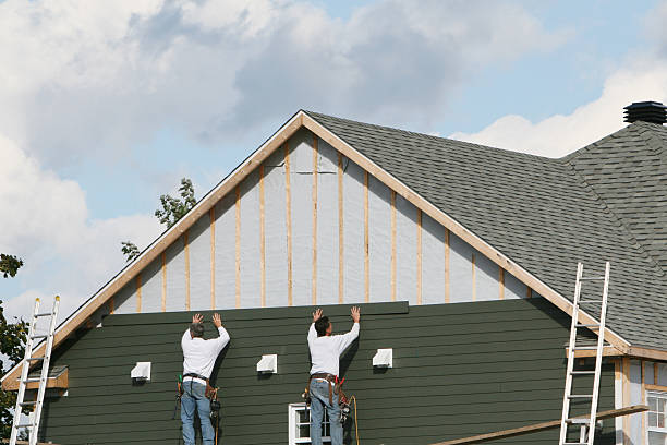 Professional Vinyl Siding technician working in Miller Place, NY